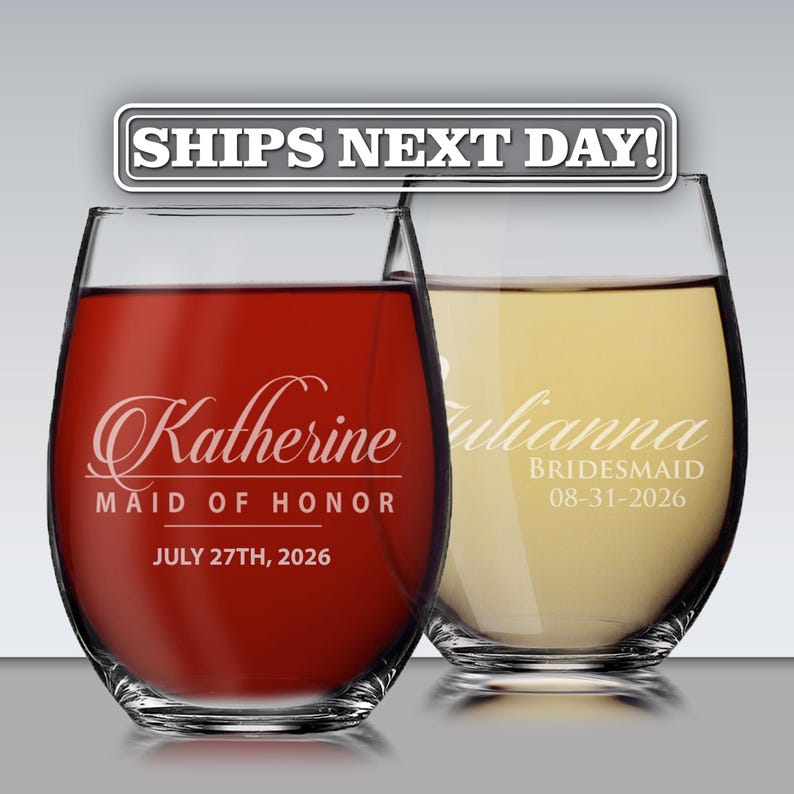May include: Two stemless wine glasses with etched white text. The left glass contains red liquid and reads Katherine, MAID OF HONOR, JULY 27TH, 2026. The right glass contains white liquid and reads Julianna, BRIDESMAID, 08-31-2026.