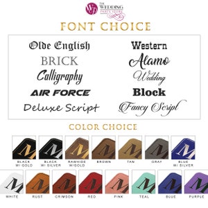 May include: A chart displaying font and colour options for customisation. Font styles include Olde English, Brick, Calligraphy, Air Force, Deluxe Script, Western, Alamo, Wedding, Block, and Fancy Script. Colour swatches show the letter M in various shades.