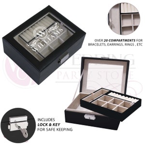 May include: A black jewelry box with a glass lid featuring the white text "W WILLIAMS" and a decorative flourish. The box includes a removable tray with multiple compartments, a beige interior, and a silver metal lock with a key for security.