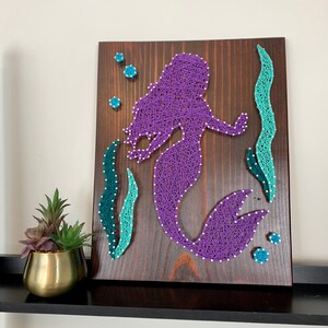 Zeemeermin met zeewierkoordkunst