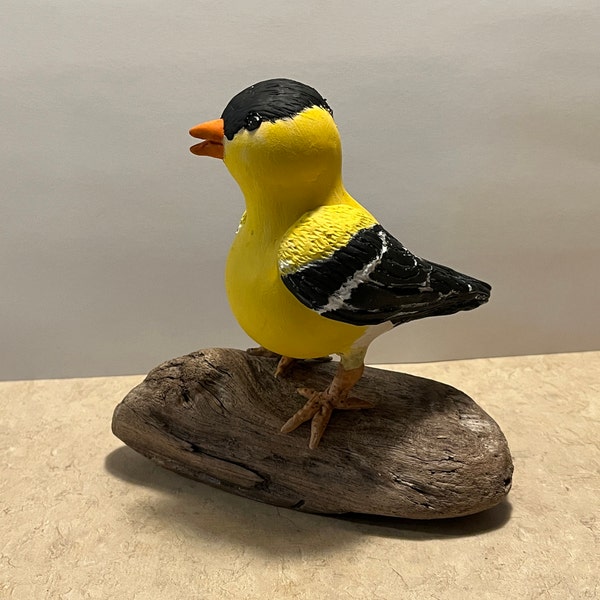 Yellow finch on driftwood, made out of several gourds.  Realistic looking for bird enthusiasts and people who love birds.  Mother’s Day gift