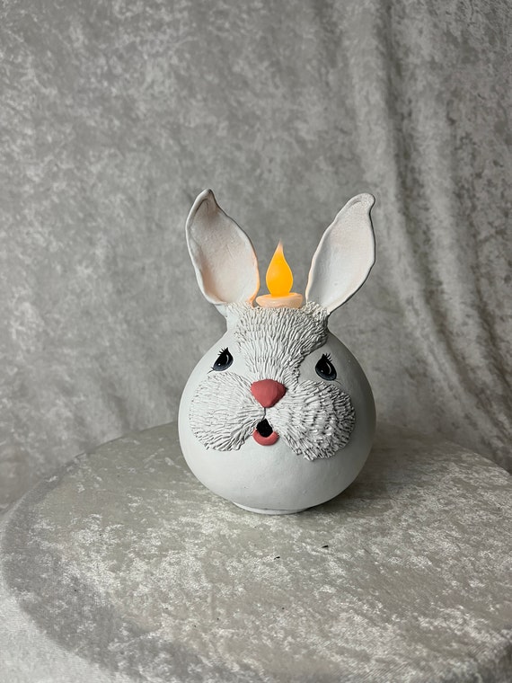 Easter Bunny lite, made out of a gourd.  LED candle with timer.
