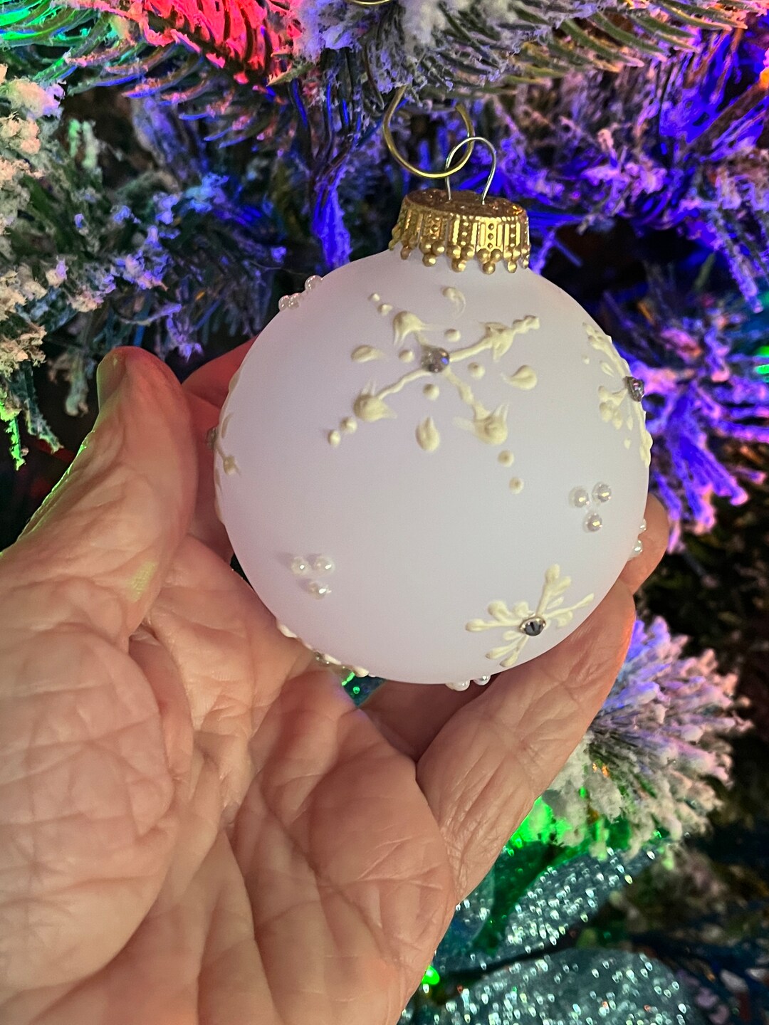White Frosted Glass Ornament. Snowflakes Are Hand Painted With Texture