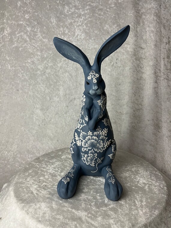 Resin Rabbit with hand painted white dimensional florals and Swarovski Crystal accents. Nice gift for Easter or anytime.  Easter Centerpiece
