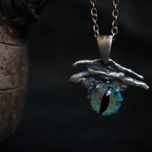 Dragon eye silver pendant with lampwork cabochon,