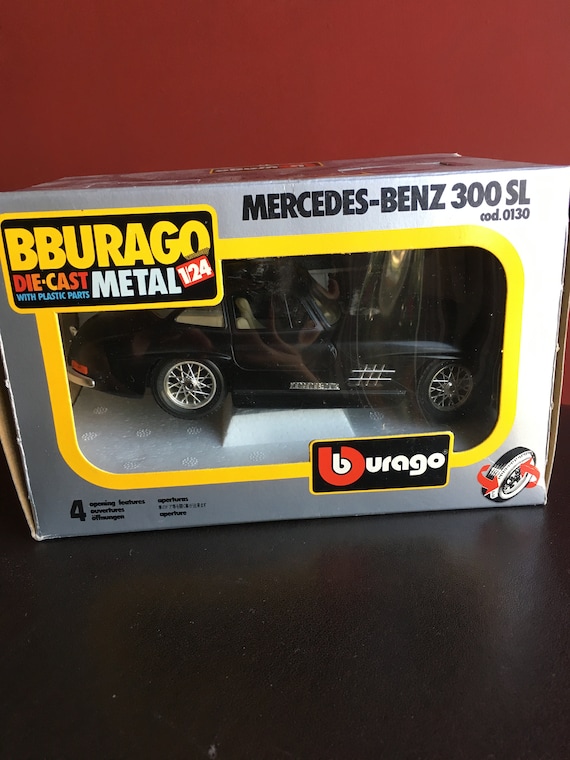 Black Mercedes Benz 300 SL, 1/24 Scale, Die-cast Metal and Black Mercedes Benz 300 SL, 1/24 Scale, Die-cast Metal and