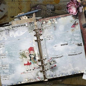 An open ring-bound planner page for December featuring a winter theme with light blue snowy backgrounds, vintage illustrations of two children, and text including December, Notes, Important, Shopping List, and A Merry Christmas.