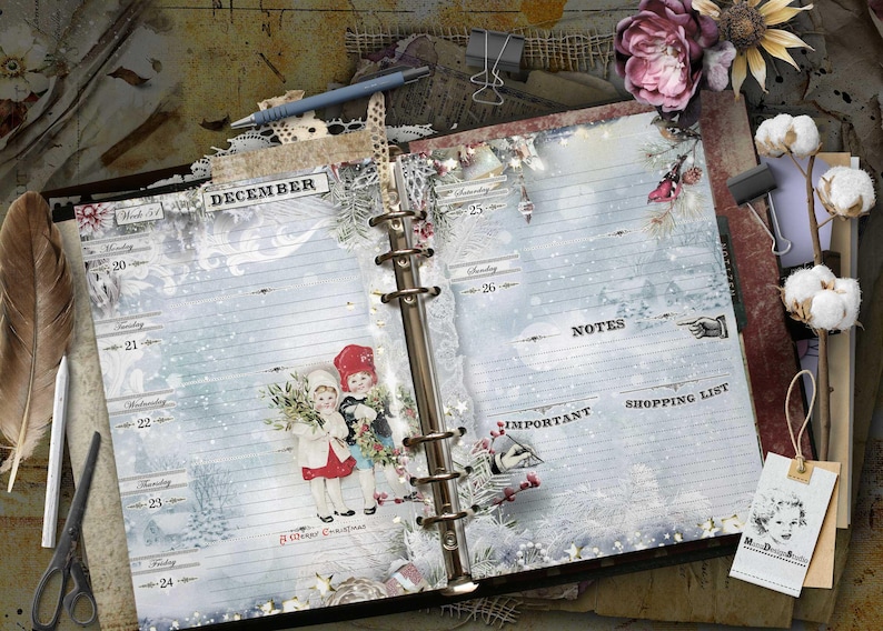 An open ring-bound planner page for December featuring a winter theme with light blue snowy backgrounds, vintage illustrations of two children, and text including December, Notes, Important, Shopping List, and A Merry Christmas.