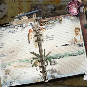 An open ring-bound planner with lined pages for July, featuring vintage-style illustrations of a bird, a child, a palm tree, and a canoe. The layout includes sections for notes, important tasks, and a shopping list with decorative elements.