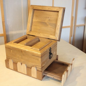 Handcrafted wooden trunk with ingenious secret compartment, chest with hiding place, sturdy trunk with inlays and decorations
