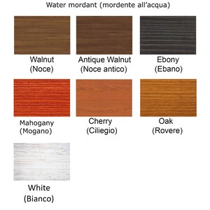 May include: Water-based wood stains in various colors, including walnut, antique walnut, ebony, mahogany, cherry, oak, and white. The stains are shown in a grid format with the name of each color written below the stain.