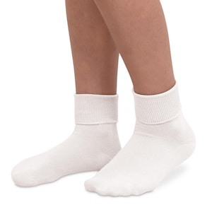 May include: A pair of white ankle socks with a ribbed cuff. The socks are made of a soft, comfortable material and are perfect for everyday wear.