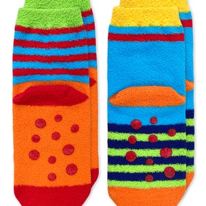 May include: A pair of colorful fuzzy socks with stripes and polka dots. The socks are orange, red, blue, green, and yellow.