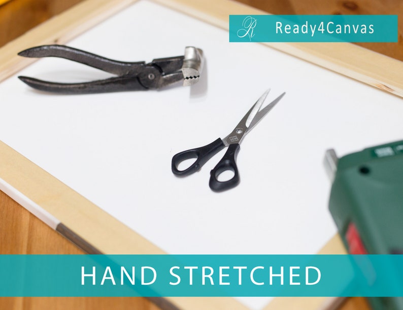 May include: A white canvas stretched on a wooden frame with a staple gun, scissors, and a tool for tightening canvas.