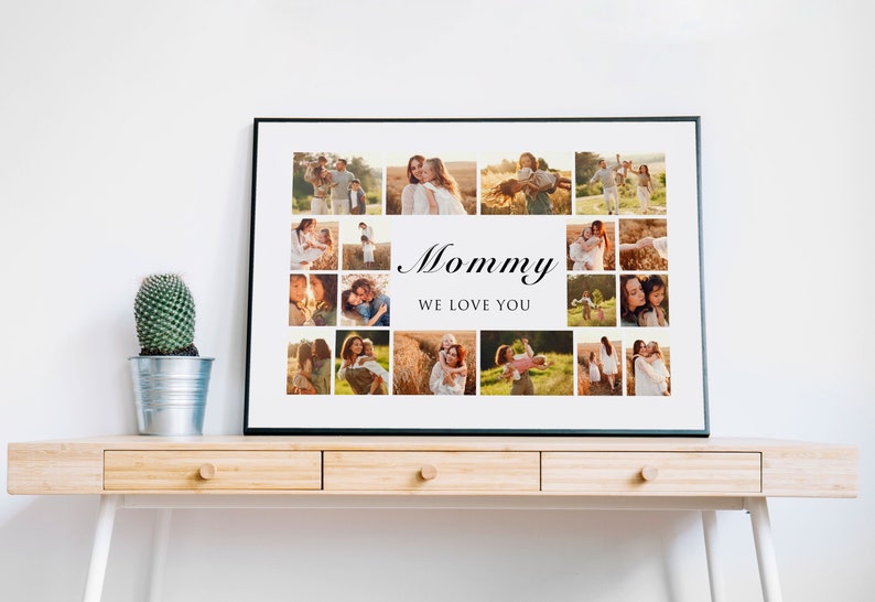 May include: A framed collage of photos with a white background and a black frame. The photos are of a family in a field. The text "Mommy We Love You" is printed in black at the bottom of the collage.