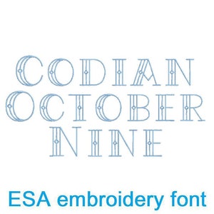 Könnte beinhalten: Auf weißem Hintergrund stehen die Worte "CODIAN OCTOBER NINE" in hellblauer, stilisierter Schrift. Darunter steht der Text "ESA embroidery font" ebenfalls in Hellblau. Die Schriftart hat einen dekorativen Art-Deco-Stil.