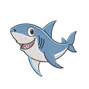 May include: Embroidered patch of a smiling cartoon shark in shades of blue, white, and pink. The shark has a friendly expression with a wide grin, visible teeth, and a large, round eye. The design is detailed with visible stitching.
