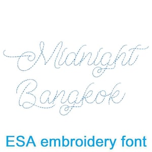 May include: Midnight Bangkok in a blue embroidered font style.  The font is a cursive script style.