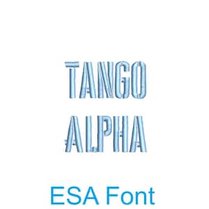 May include: A blue and white embroidered design with the text "TANGO ALPHA" and the words "ESA Font" in blue text below.