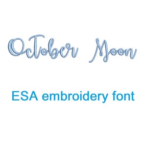 May include: October Moon in a light blue cursive font. The text is displayed on a white background.  ESA embroidery font.
