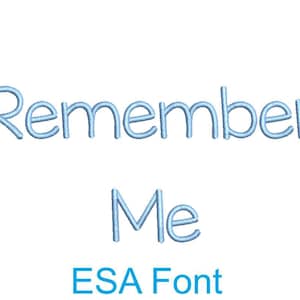 May include: Light blue embroidered text that reads "Remember Me" in a font called "ESA Font".