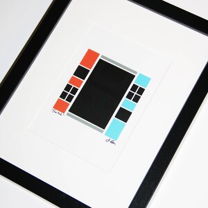 May include: Abstract art print titled "Switch" in a black frame. The artwork features a black rectangle at the center, flanked by orange and blue rectangular blocks with black squares. The print is on white paper.