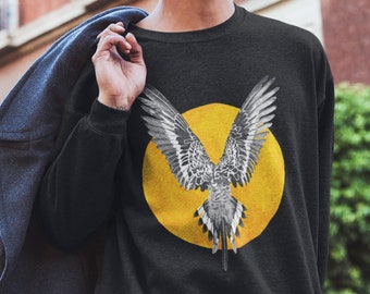 Ailes d’ange | Unisex Heavy Blend Crewneck Sweatshirt | Perroquet volant au soleil | Illustration d’oiseau | Icare | Liberté | Travail de point | Stipple