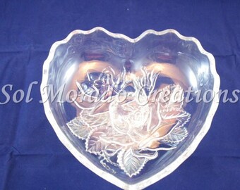 Heart shaped floral candy dish on stand.