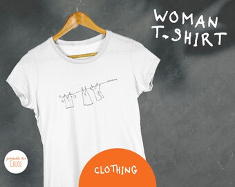 Women's T-shirt, feminine cut, in organic cotton, custom printed with minimalist black drawing of 3 hanging T-shirts