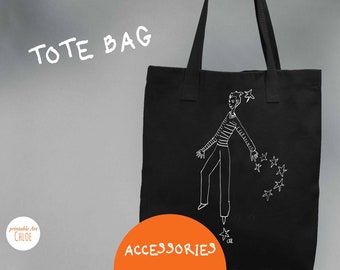 Tote bag negro bio y reciclado - personaje volando con las estrellas