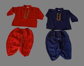 May include: Two sets of children's clothing. One set is red and the other is blue. Each set includes a long-sleeved shirt with a button closure and a pair of pants.