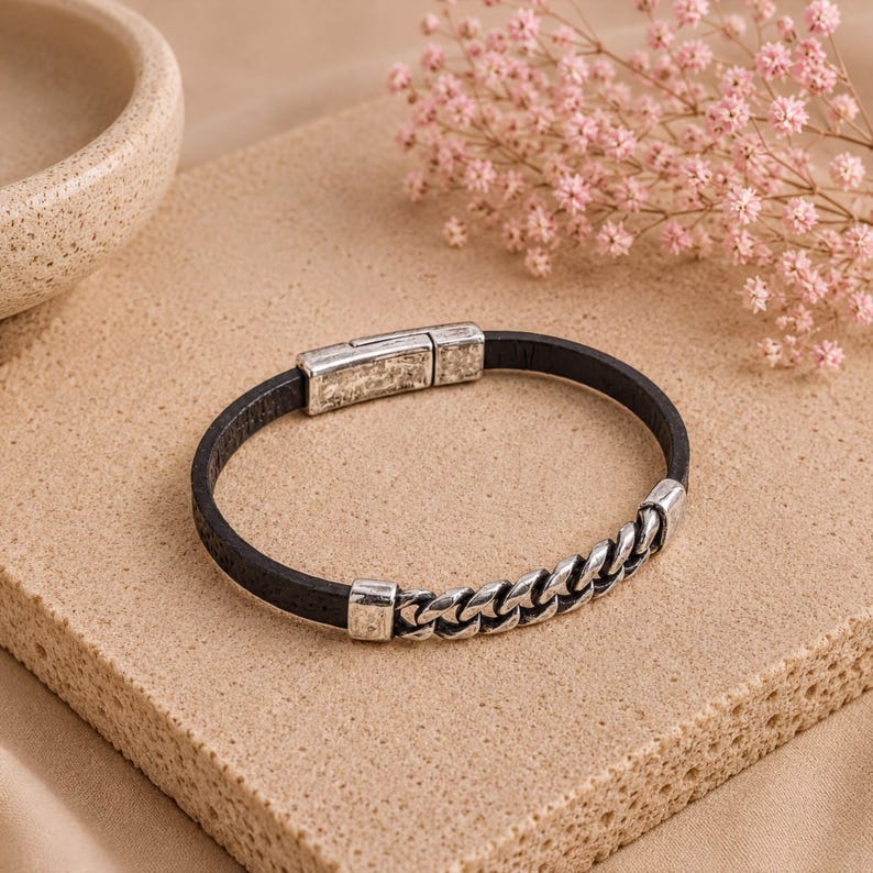 Statement Bracelet Bold Design Black Leather Material Chain Bar Detail Magnetic Clasp Feature Italian Camel Leather Quality Antique Silver Accent Unique Fashion Accessory Minimalist Wrist Jewelry Everyday Style Element Modern Fashion
