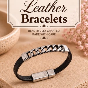 a handcrafted leather bracelet with a metal chain link design, placed on a textured surface.