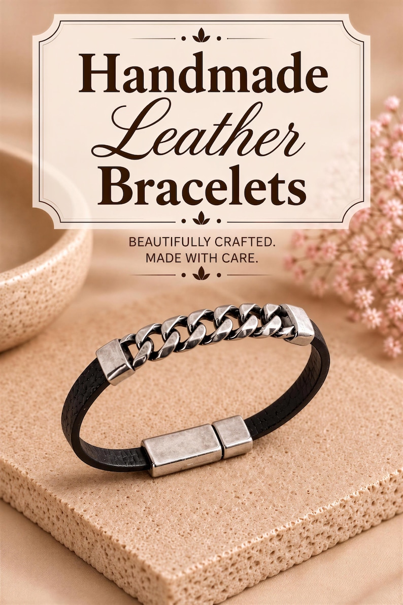 a handcrafted leather bracelet with a metal chain link design, placed on a textured surface.
