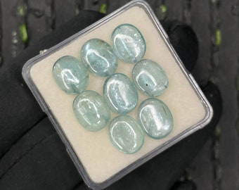 Koop mooie gladde glanzende aqua kyaniet platte achterkant Lot ovale vorm fijne kwaliteit 8X10 MM - 8 stuks, kyaniet platte achterkant voor het maken van sieraden.