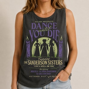 May include: A charcoal grey sleeveless tank top featuring a graphic print with the text SALEM PRESENTS: DANCE UNTIL YOU DIE, featuring the Sanderson Sisters, I PUT A SPELL ON YOU, and other event details with purple candles and a green moon.
