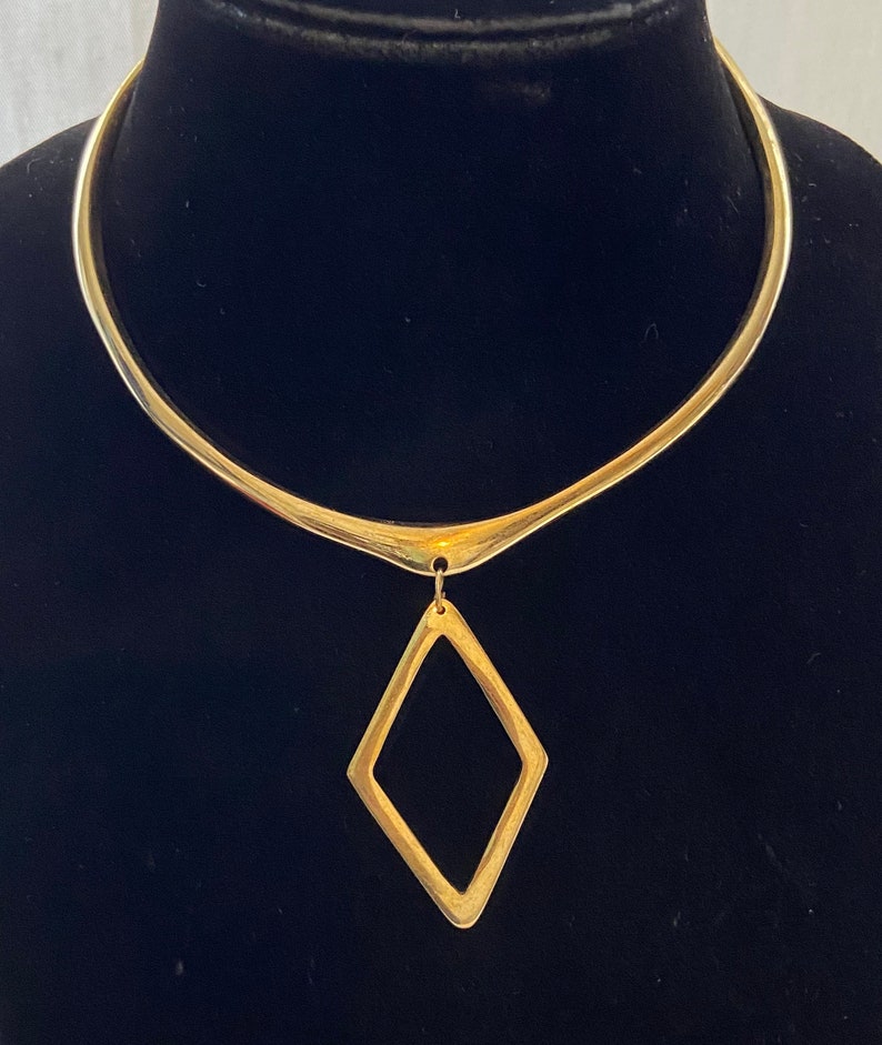 Tanga brass choker collection