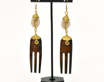 Comb brass / bone cowrie shell earrings collection.