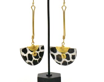 Bone / brass earrings collection.  Handmade in Kenya.