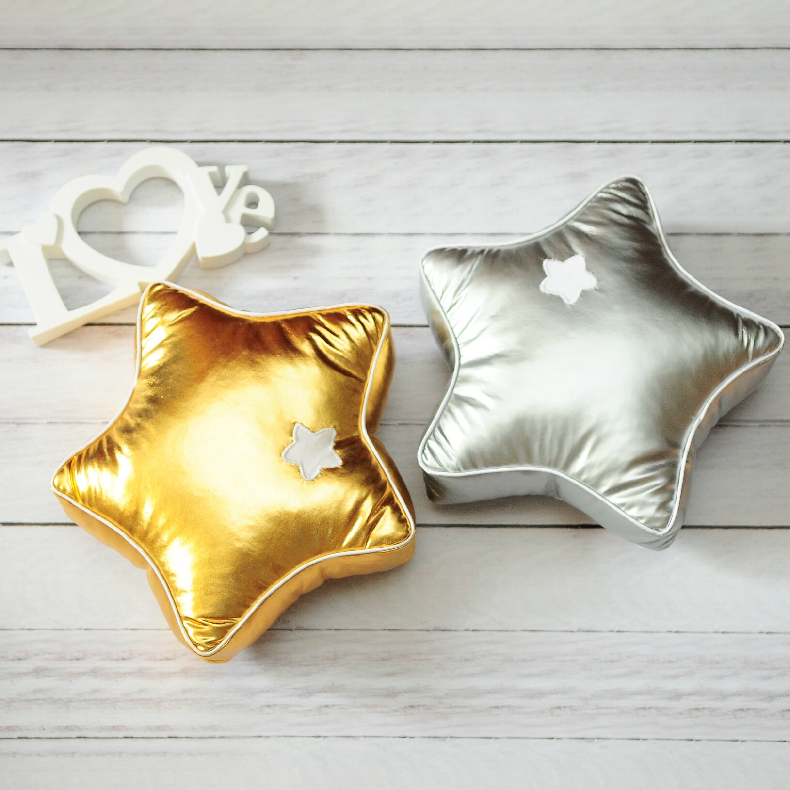 Free standing gold and silver star shaped pillows with name on Etsy