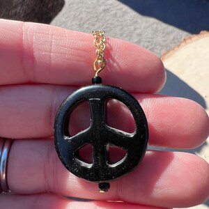 Onyx peace sign and brass necklace