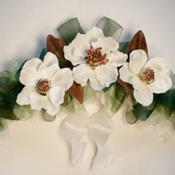 Arch magnolia floral swag, spring magnolia swag, handmade magnolia hand wired ribbon swag, everyday swag.