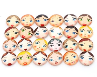 May include: Twenty-four round glass cabochons with painted faces of women. Each cabochon features a different face with varying hair colors, eye colors, and facial expressions.