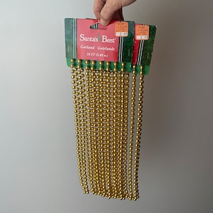 Vintage Christmas Garland Gold Beads 18 Ft. Kitsch Vintage Packaging Vintage Crafts Kitschmas Santa’s Best Garland