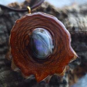 May include: A set of three ceramic vases in varying heights. The vases are white with a matte finish and feature a textured, ridged design. The tallest vase is approximately 10 inches tall.