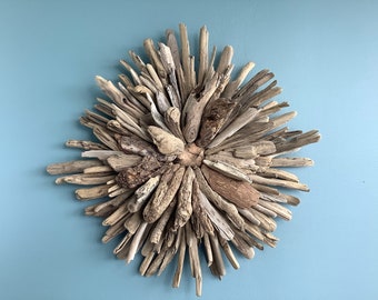 Driftwood Flower - Layer upon layer. This signature flower honors the depth of Nature. The finishing touch is a top layer of stunning pieces