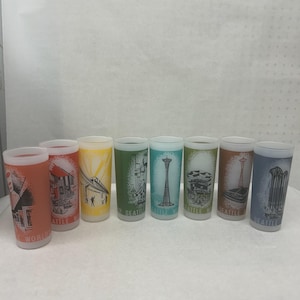 1962 Seattle World’s Fair frosted drinking glasses. This set of 8 glasses are in excellent condition. The graphics are classic MCM designs.