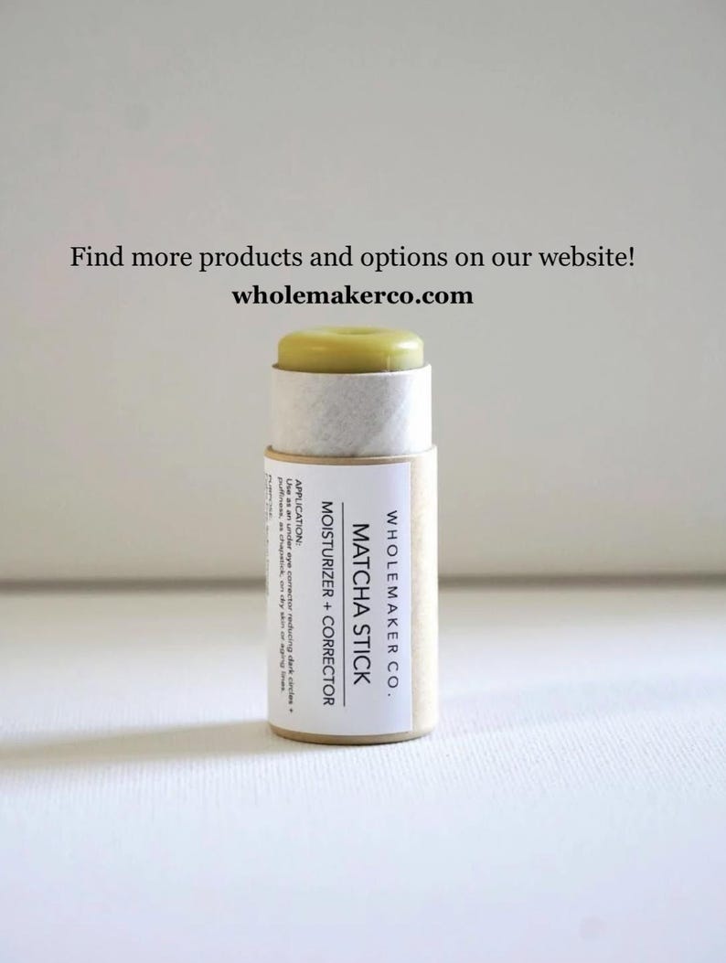 May include: A Matcha Stick moisturizer and corrector by Wholemaker Co. The product is in a cylindrical container with a light green top. The label includes the text "MOISTURIZER + CORRECTOR" and "MATCHA STICK". The website is wholemakerco.com.