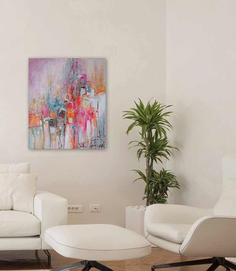 Op de afbeelding: Abstract schilderij met roze, oranje, blauwe en witte kleuren. Het schilderij is op canvas en heeft een textuur.