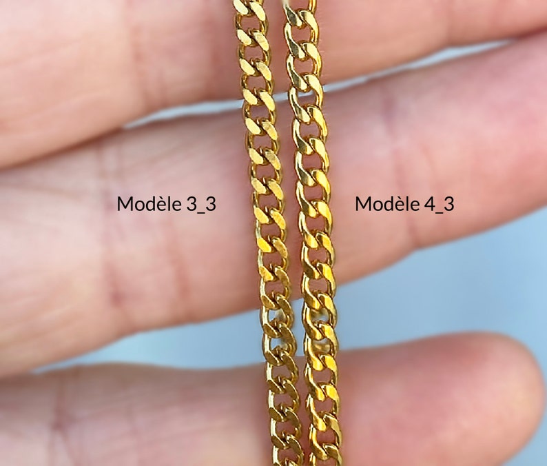 May include: Two gold chains, side by side, labeled "Mod&egrave;le 3_3" and "Mod&egrave;le 4_3". The chains are both curb chains, but the chain labeled "Mod&egrave;le 4_3" is thicker than the chain labeled "Mod&egrave;le 3_3".